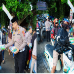 Kasatlantas Polres Banggai, AKP I Made Bagus Aditya dan Kanit REgident Polres Banggai Ipda Suparjan, SH saat membagikan Takjil Ramadhan di Tugu Adipura