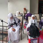 Wawali Kota Palu, Imelda Lilian Muhidin dan Calon Jamaah Haji Asal Kota saat mengikuti acara pelepasan